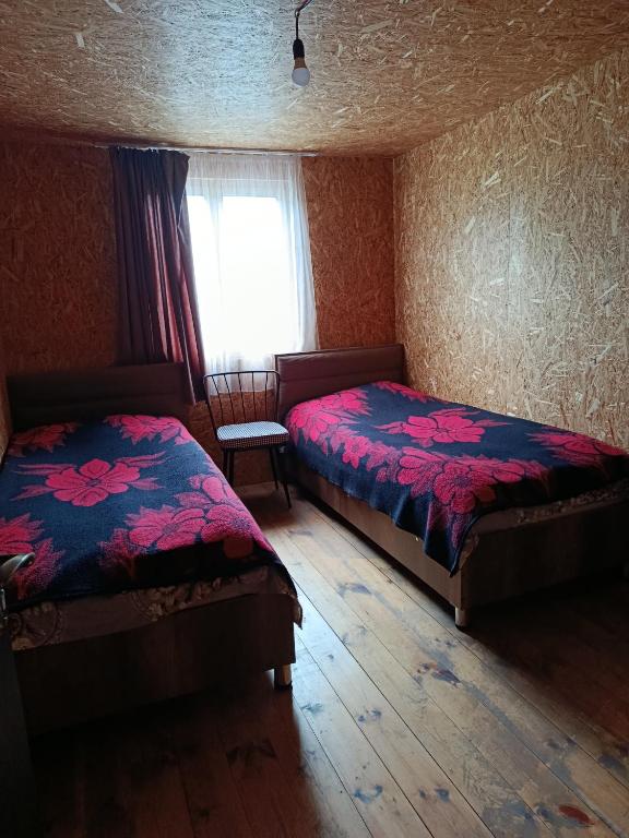 Postel nebo postele na pokoji v ubytování Guesthouse Elisabeth