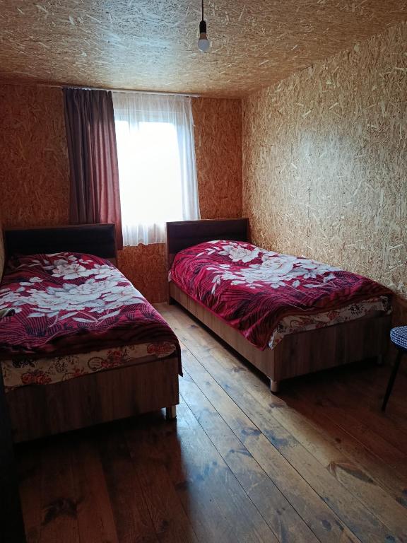 Postel nebo postele na pokoji v ubytování Guesthouse Elisabeth
