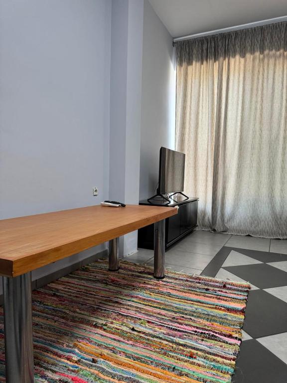 TV a/nebo společenská místnost v ubytování Mezzanine