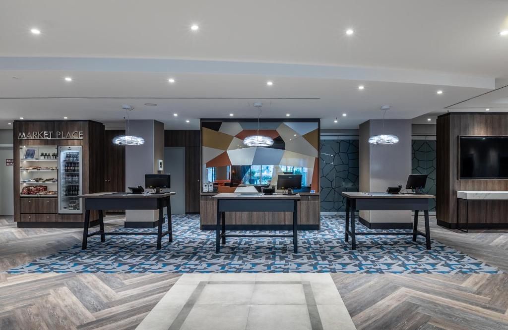 TV a/nebo společenská místnost v ubytování NYX Hotel Erfurt by Leonardo Hotels