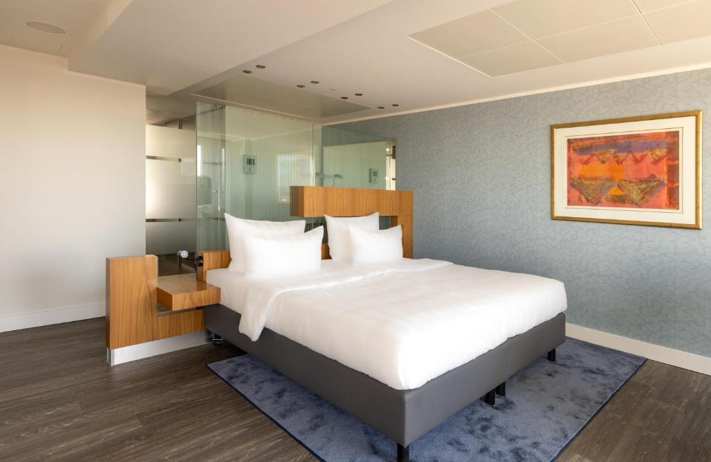 Postel nebo postele na pokoji v ubytování NYX Hotel Erfurt by Leonardo Hotels