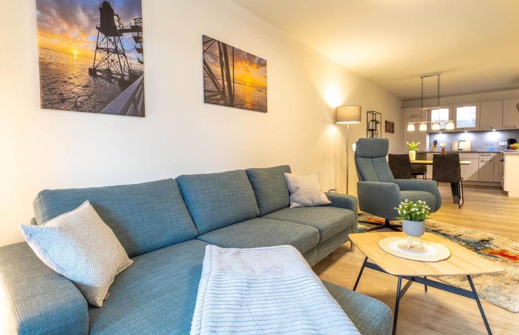 Posezení v ubytování Ankerpunkt Südost - Ferienwohnung mit Garten und Sauna