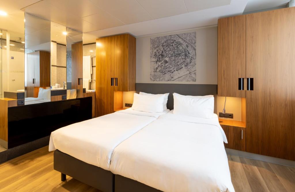 Postel nebo postele na pokoji v ubytování NYX Hotel Erfurt by Leonardo Hotels