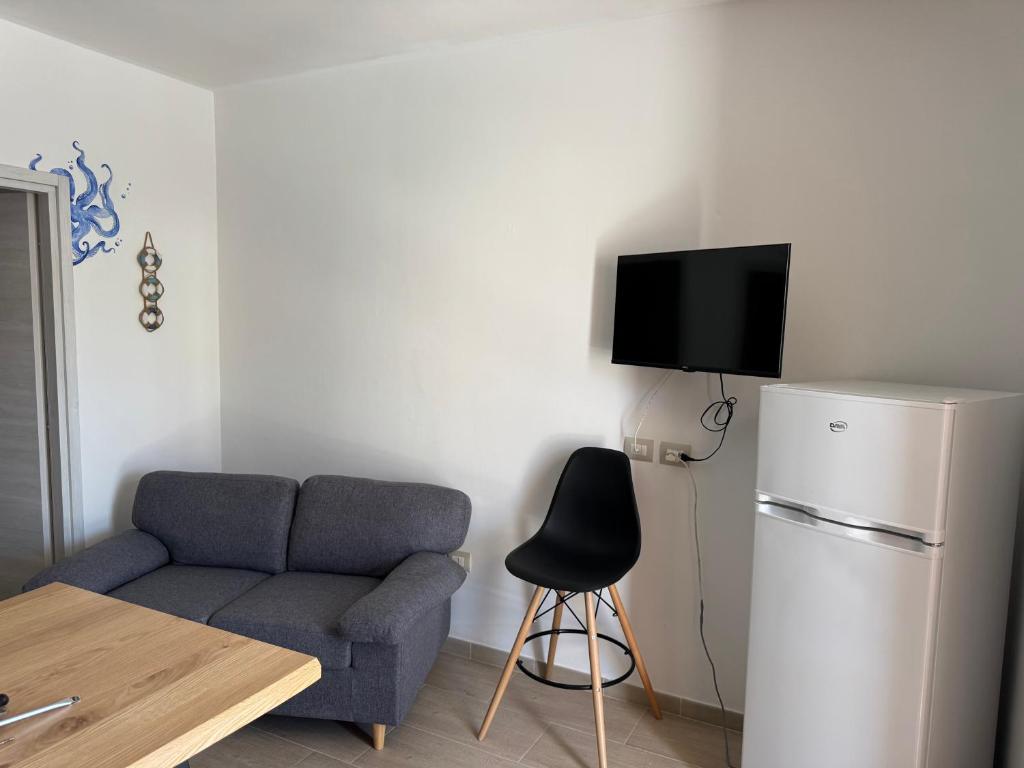 TV a/nebo společenská místnost v ubytování Casa Mareblu