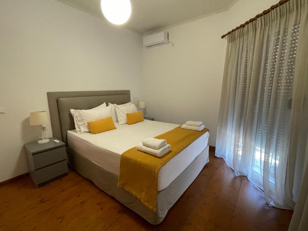 Postel nebo postele na pokoji v ubytování Ionian Grand - Apartments