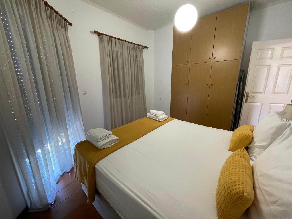 Postel nebo postele na pokoji v ubytování Ionian Grand - Apartments