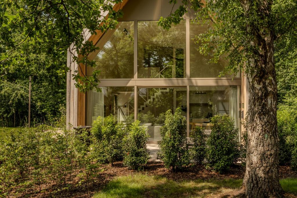 Κήπος έξω από το Lodge - 4 personen - Woodz Lodges