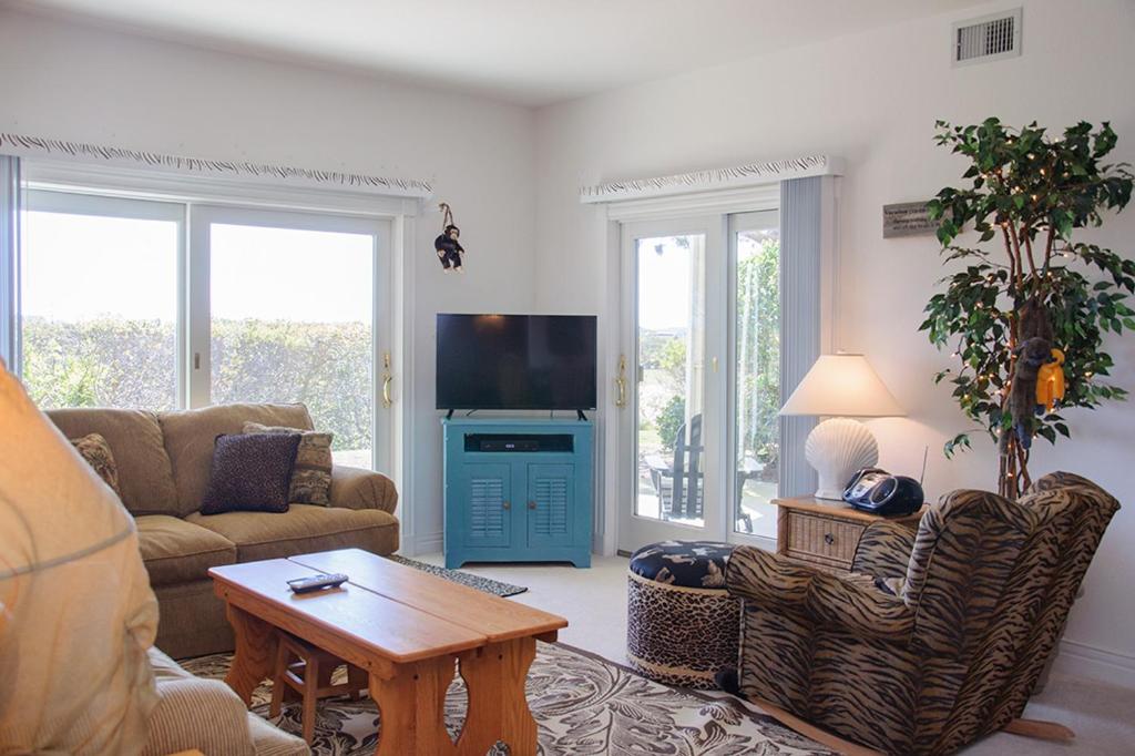 TV a/nebo společenská místnost v ubytování Monkey Business