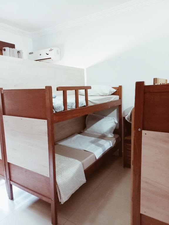 Postel nebo postele na pokoji v ubytování Frida Hostel