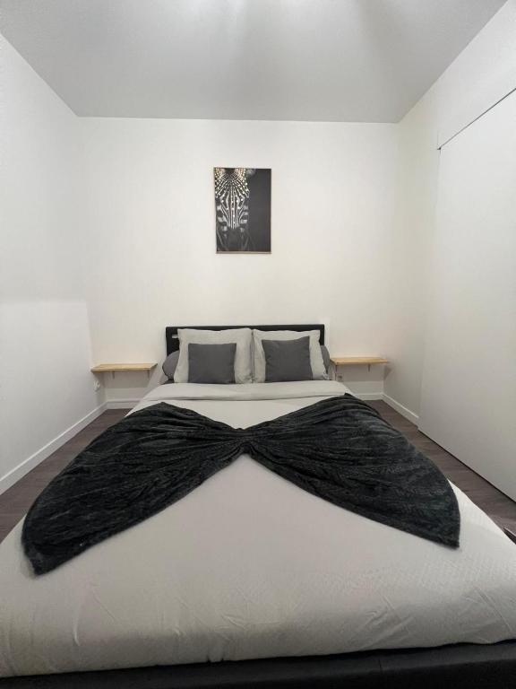 Postel nebo postele na pokoji v ubytování Le Confidentiel avec parking