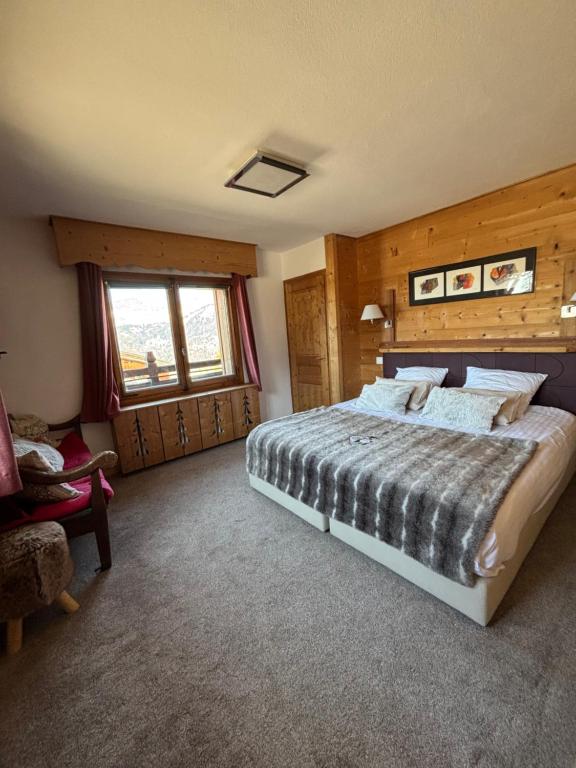 Postel nebo postele na pokoji v ubytování Chalet Hôtel du Mont-Charvin & Spa