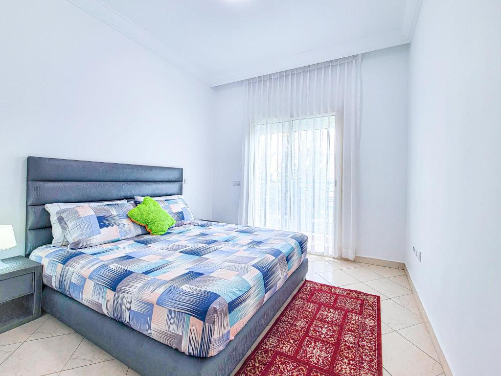 Ένα ή περισσότερα κρεβάτια σε δωμάτιο στο Résidence Riviera beach