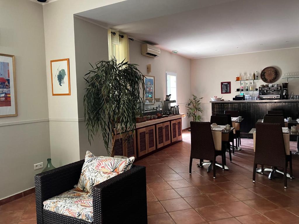 Posezení v ubytování Hotel Du Vignoble