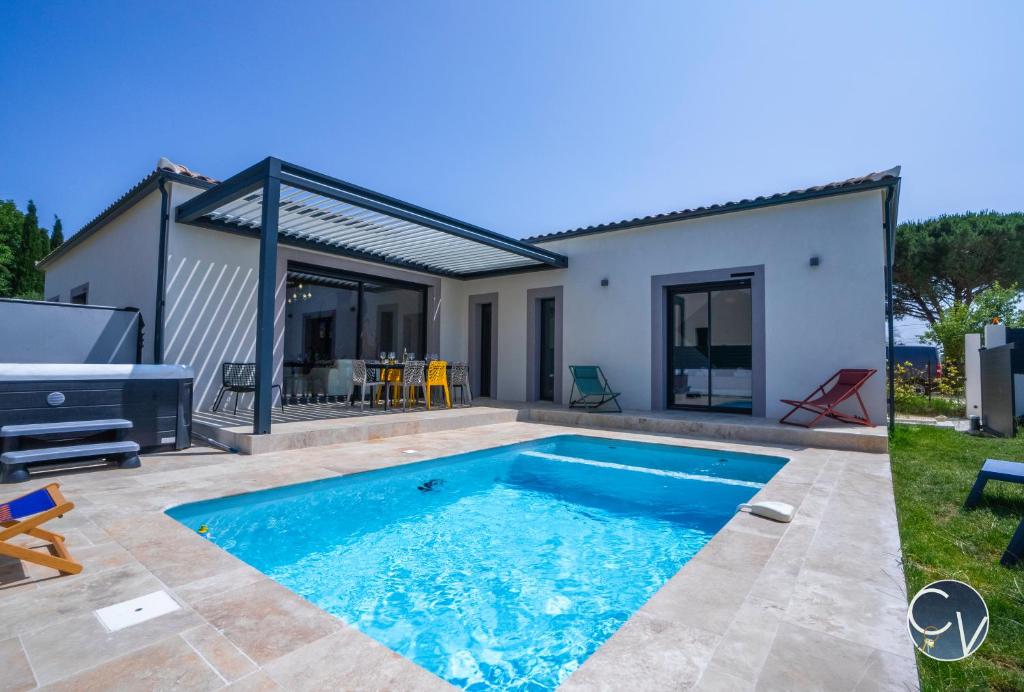 Πισίνα στο ή κοντά στο Villa moderne tout confort-Jacuzzi-Piscine