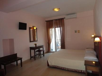Postel nebo postele na pokoji v ubytování Galini Sea Apartments