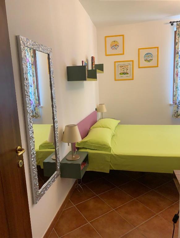 Łóżko lub łóżka w pokoju w obiekcie Casa Paola nel Chianti