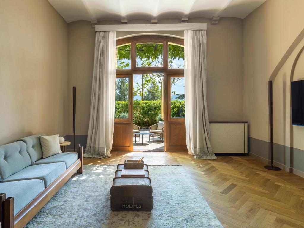 Posezení v ubytování Borgo Dei Conti Resort Relais & Chateaux