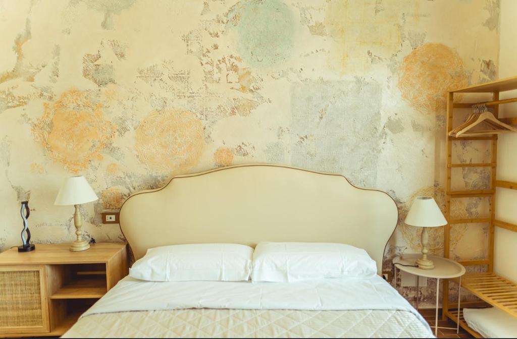 Postel nebo postele na pokoji v ubytování BnB Montepulciano