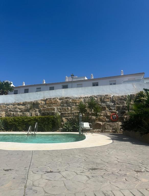 Basen w obiekcie Agradable casa adosada con piscina lub w pobliżu