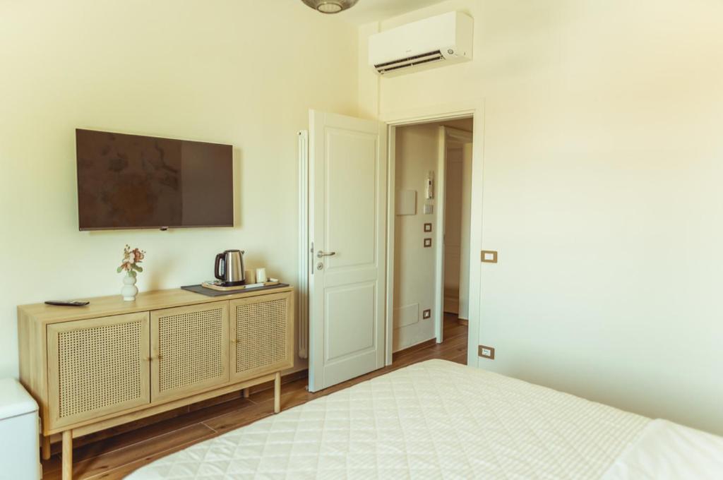 Postel nebo postele na pokoji v ubytování BnB Montepulciano