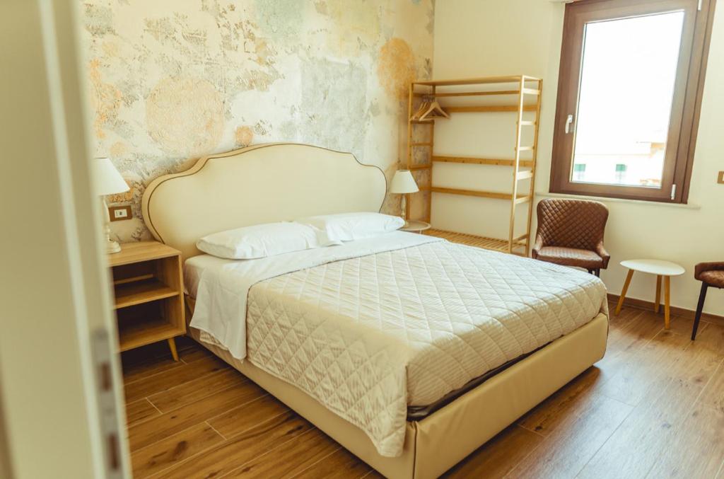 Postel nebo postele na pokoji v ubytování BnB Montepulciano