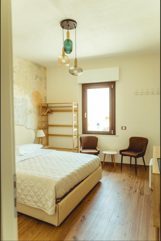 Postel nebo postele na pokoji v ubytování BnB Montepulciano