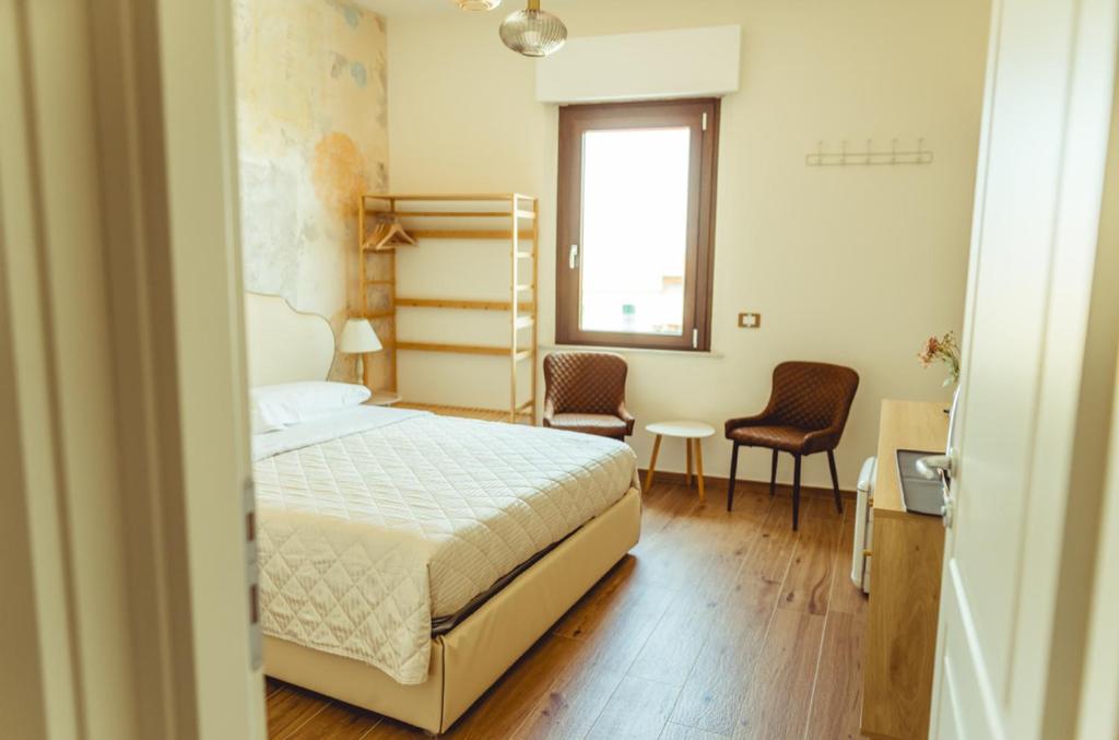 Postel nebo postele na pokoji v ubytování BnB Montepulciano