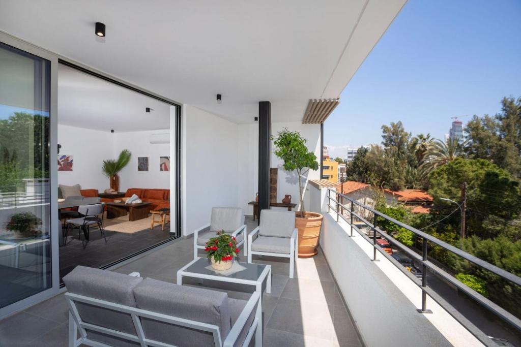 an apartment balcony with a view of the city at Bridge House 201 - 3BR Penthouse in Limassol