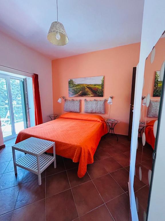 Postel nebo postele na pokoji v ubytování Il Gelso