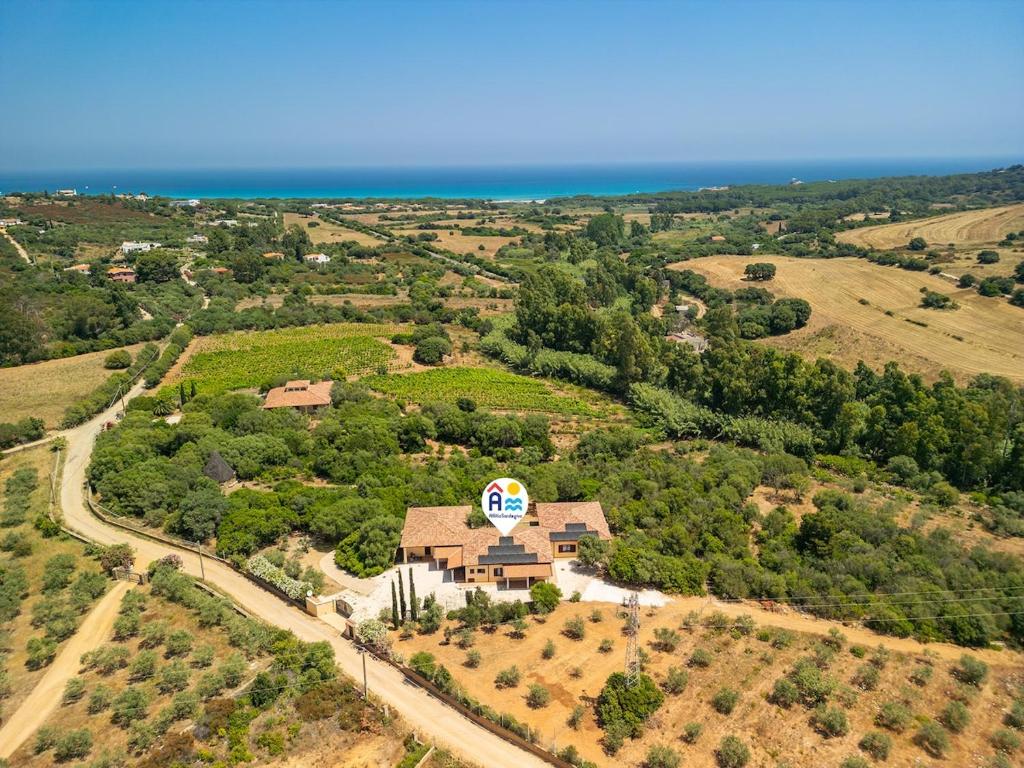 an aerial view of a house with a sign on it at AffittaSardegna - Trilo Euforbia in Santa Lucia