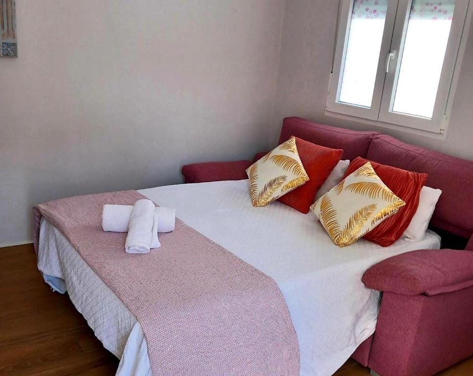 Posteľ alebo postele v izbe v ubytovaní Apartamento De la Haya, junto al Teatro Romano