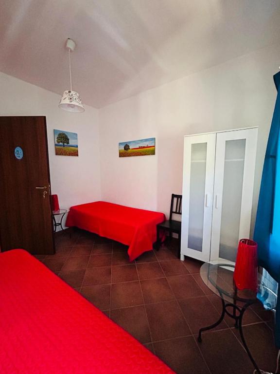 Postel nebo postele na pokoji v ubytování Il Gelso