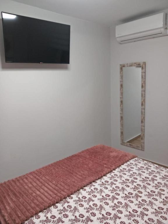 Posteľ alebo postele v izbe v ubytovaní Apartamento De la Haya, junto al Teatro Romano