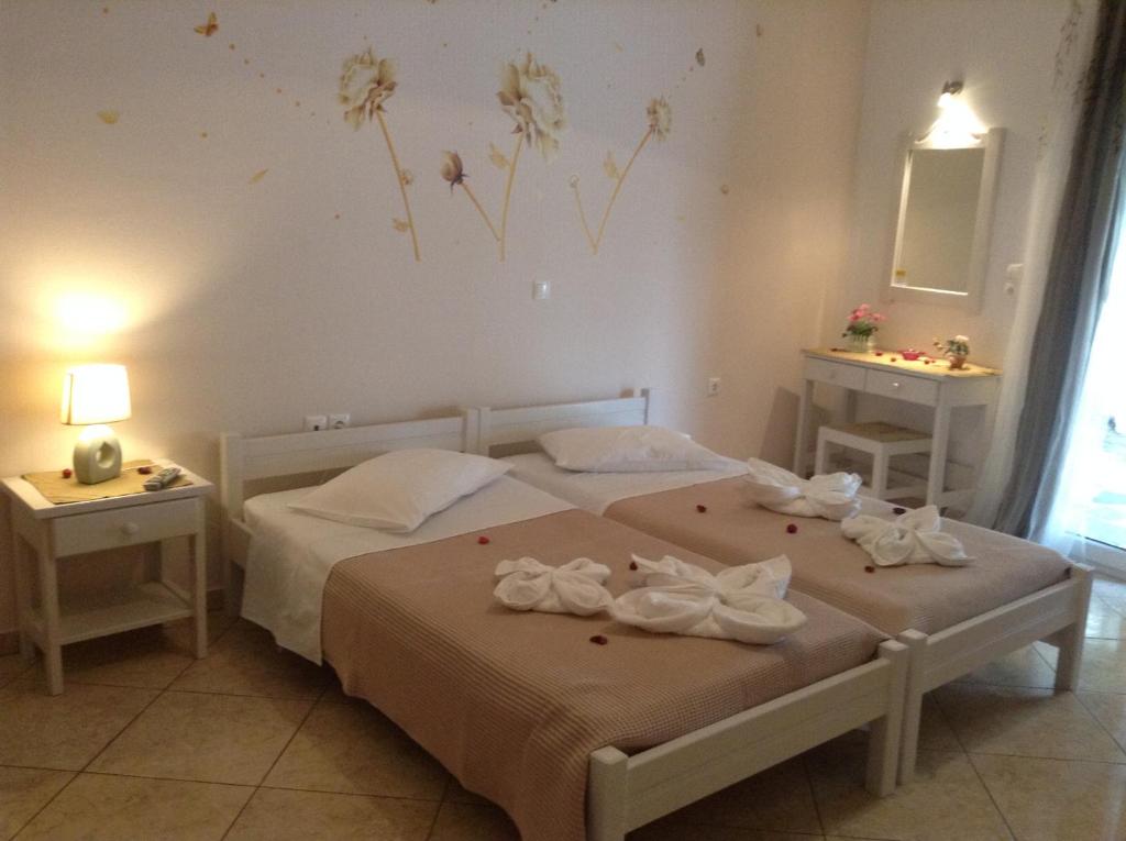 Posteľ alebo postele v izbe v ubytovaní Nikoletta Rooms