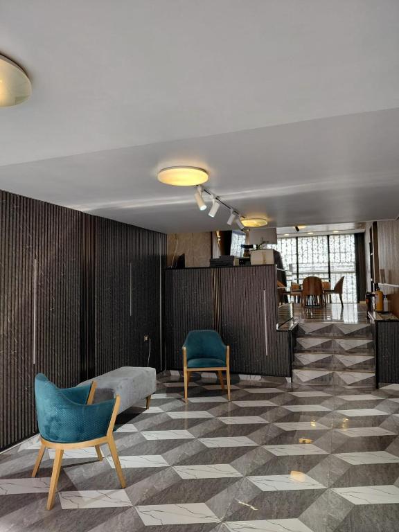 Posezení v ubytování Hotel American Visa Normandia