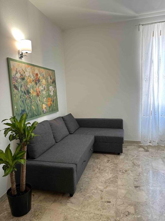 Χώρος καθιστικού στο Casa Morgana Two-room apartment in the center overlooking the lake