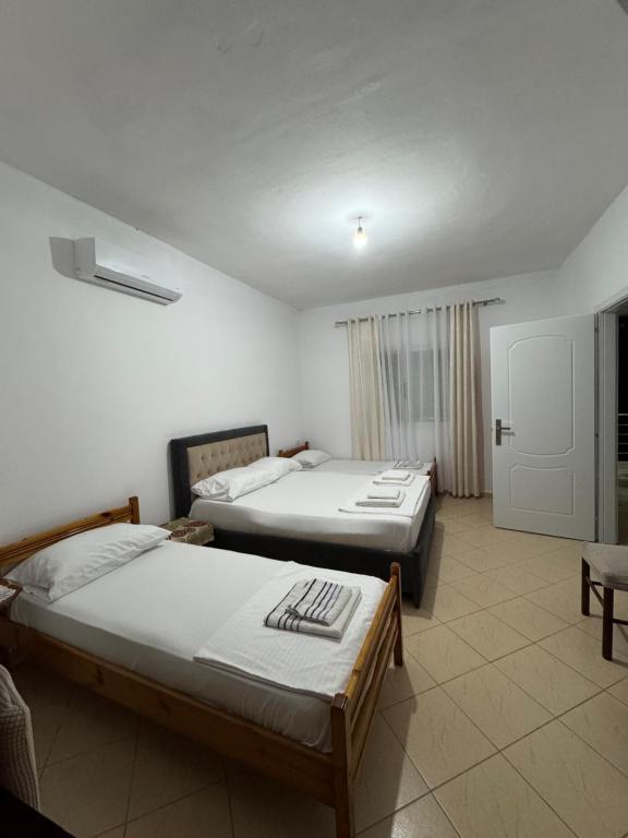 Postel nebo postele na pokoji v ubytování Family Apartment