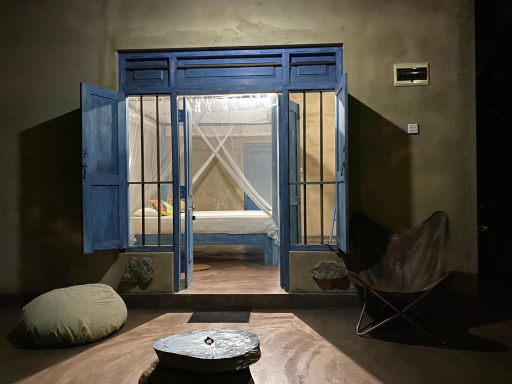 Postel nebo postele na pokoji v ubytování Kataragama Homestay
