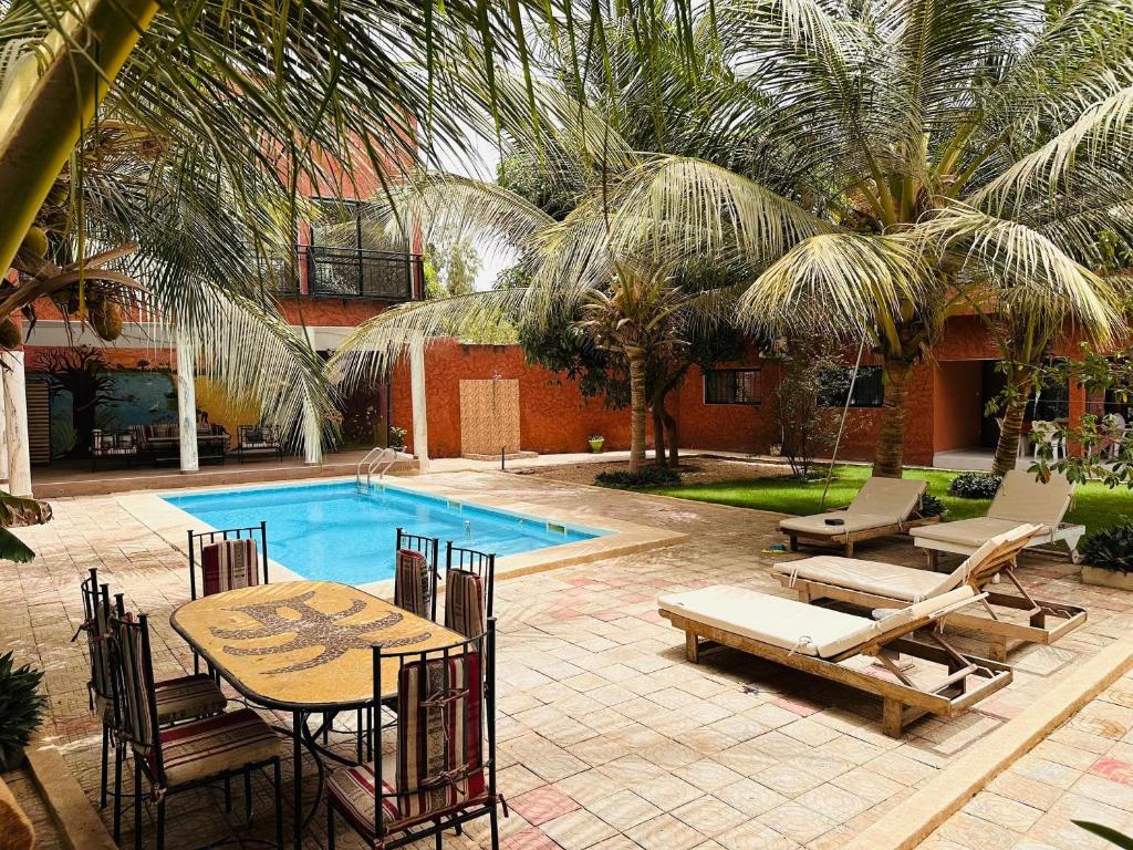 Bazén v ubytování Résidence Diaw's Saly nebo v jeho okolí