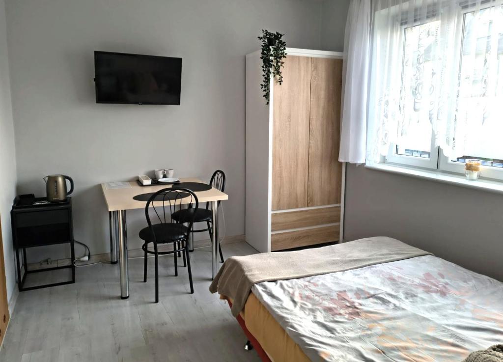 Posteľ alebo postele v izbe v ubytovaní U Szwagra