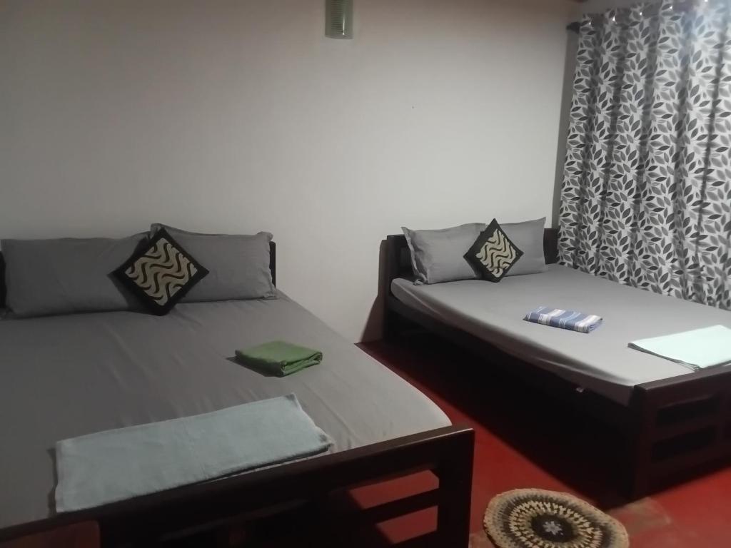 Postel nebo postele na pokoji v ubytování Ocean View Beach Resort - Kalpitiya