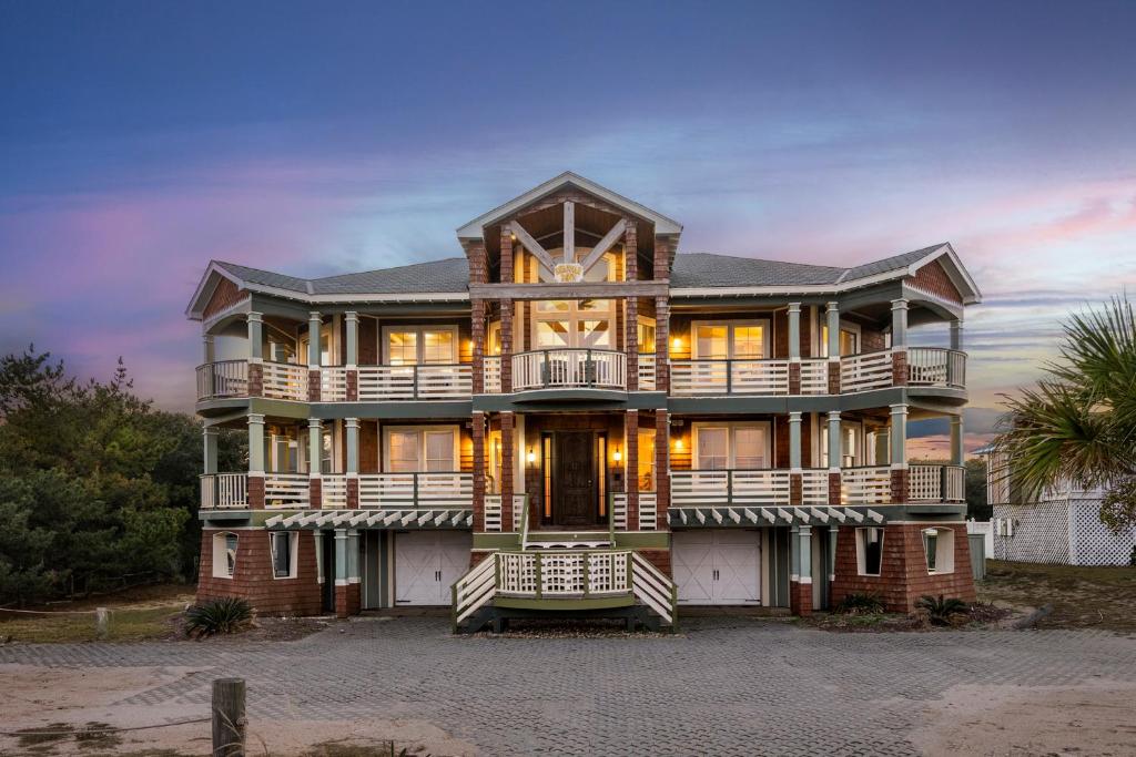 a large house with a gambrel at Savannah Dawn in Southern Shores