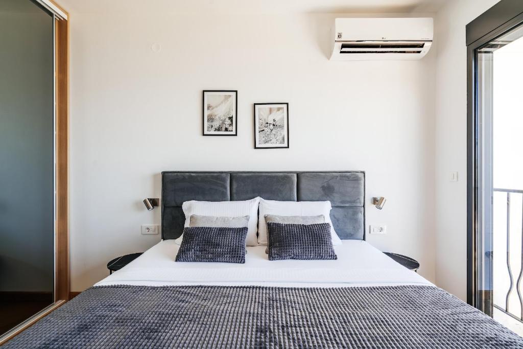 Una cama o camas en una habitación de Monte Living by In Property