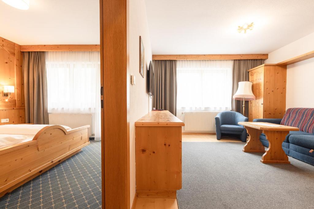 Posteľ alebo postele v izbe v ubytovaní Aparthaus Camping Stubai