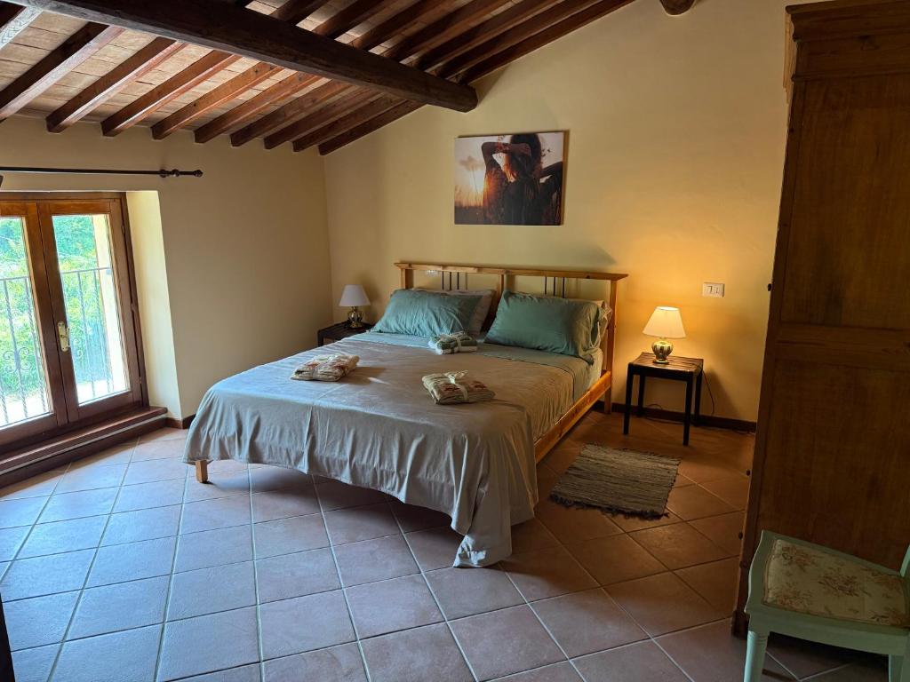 a bedroom with a bed in a room at Affittacamere Del Piano - Private Parking in Orvieto Scalo