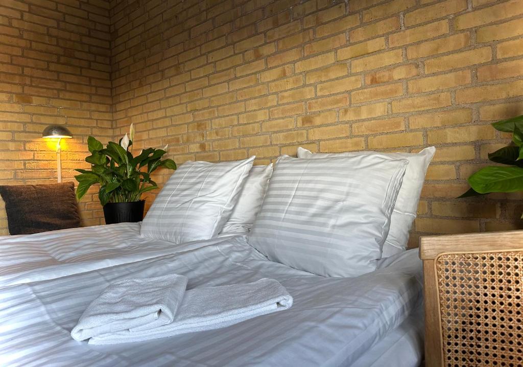 Ένα ή περισσότερα κρεβάτια σε δωμάτιο στο MOVE Eco Health Hotel