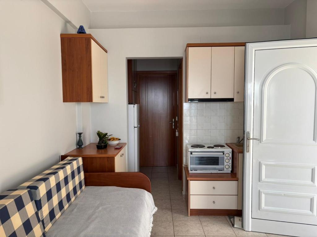 Kuchyň nebo kuchyňský kout v ubytování Iria Bay