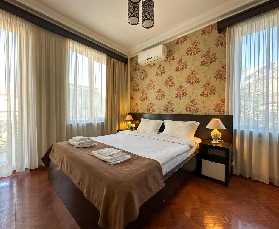 Postel nebo postele na pokoji v ubytování Hotel Four Brothers