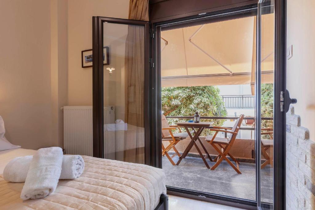Postel nebo postele na pokoji v ubytování Mpalkoni Sti Monemvasia