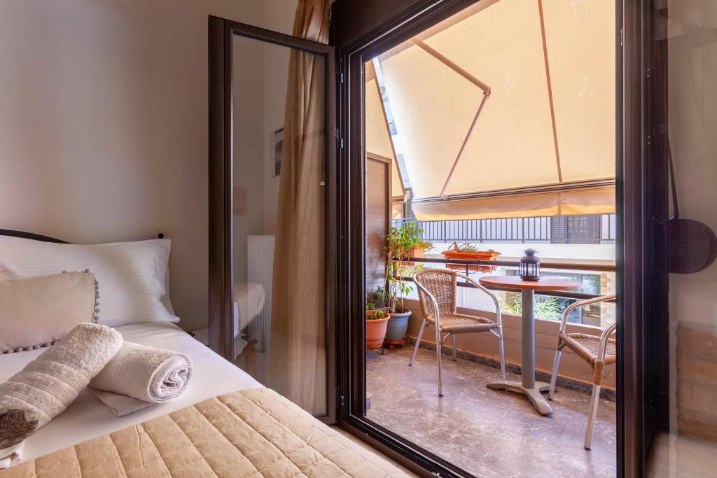 Postel nebo postele na pokoji v ubytování Mpalkoni Sti Monemvasia
